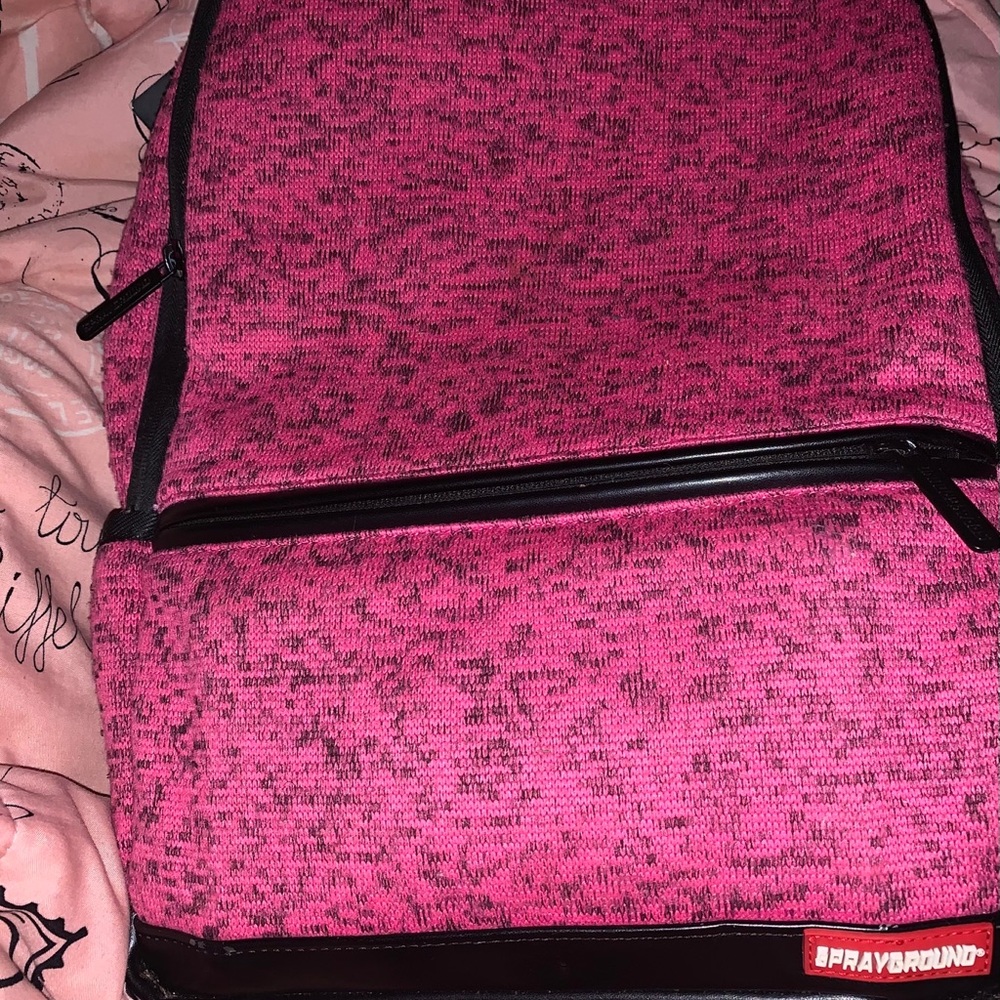 Spray ground backpack